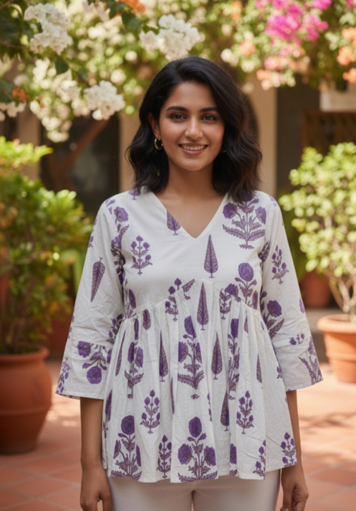 The Artisanal Indigo Bloom Peplum Top